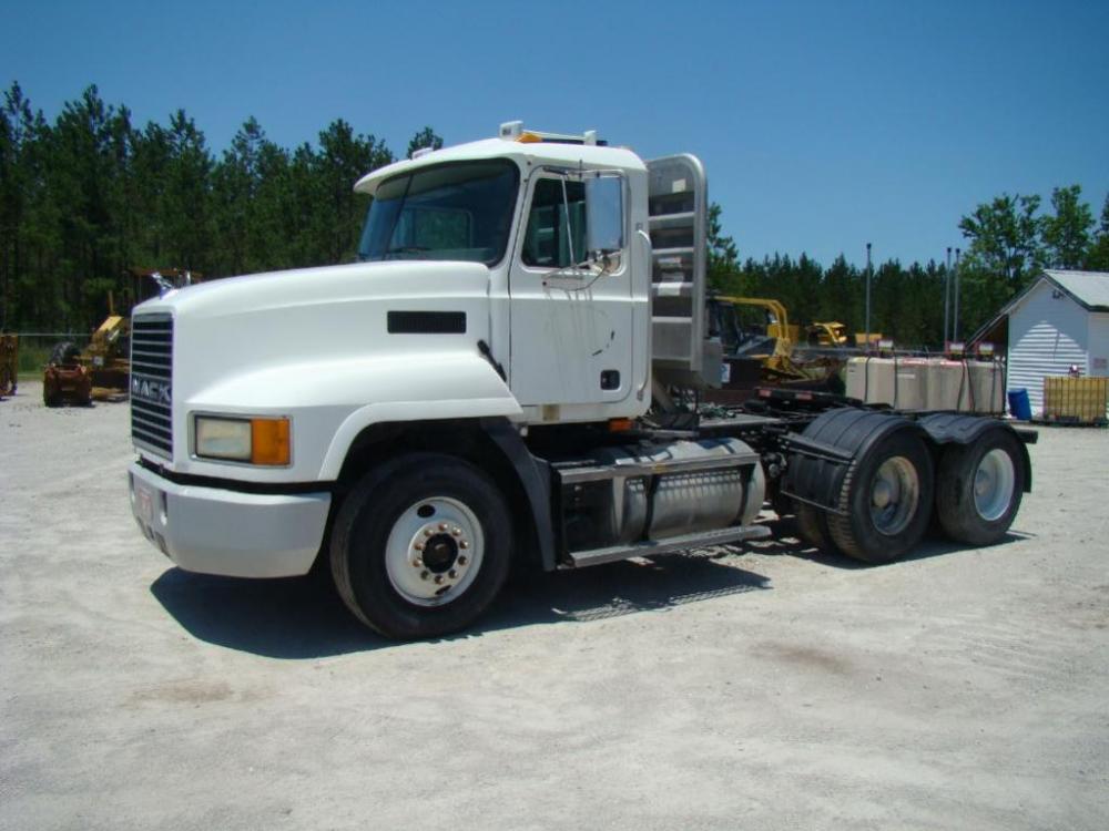 2003 MACK CH613 Tandem Axle, Twin Screw, Day Cab, with MERRITT Aluminum Cab Rack, Wet-Lines, showing 397,110 miles, VIN: 1M1AA18Y33W151532