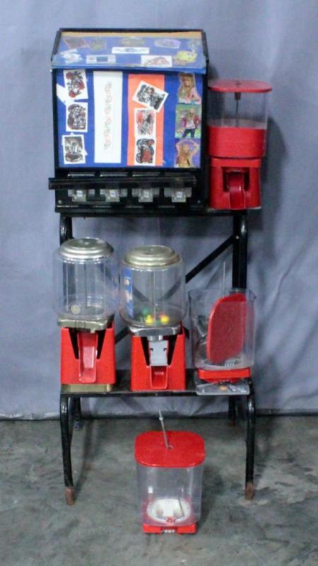 6-Way Vending Machine Stand with Machines for Parts or Repair, Sticker/Tattoo Flat Machine, and Assorted Partially Disassembled Gumball Candy Machine
