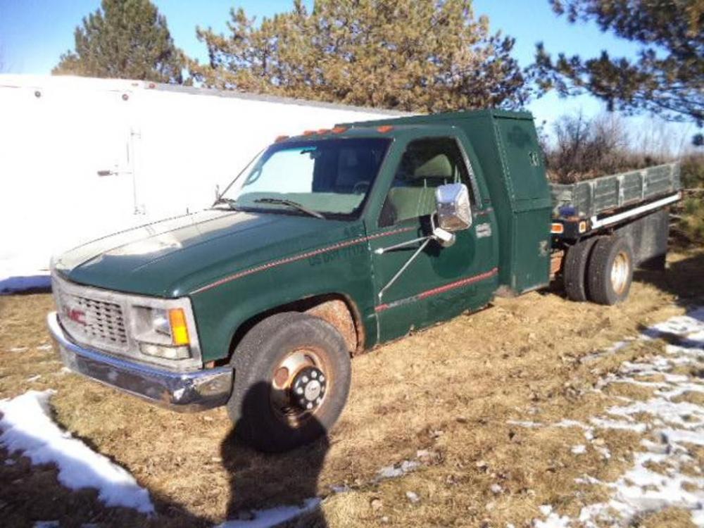 1999 GMC 3500 Single Axle Stake Bed Truck, VIN: 1GDJC34ROXF058098, 95,343 Miles Indicated,